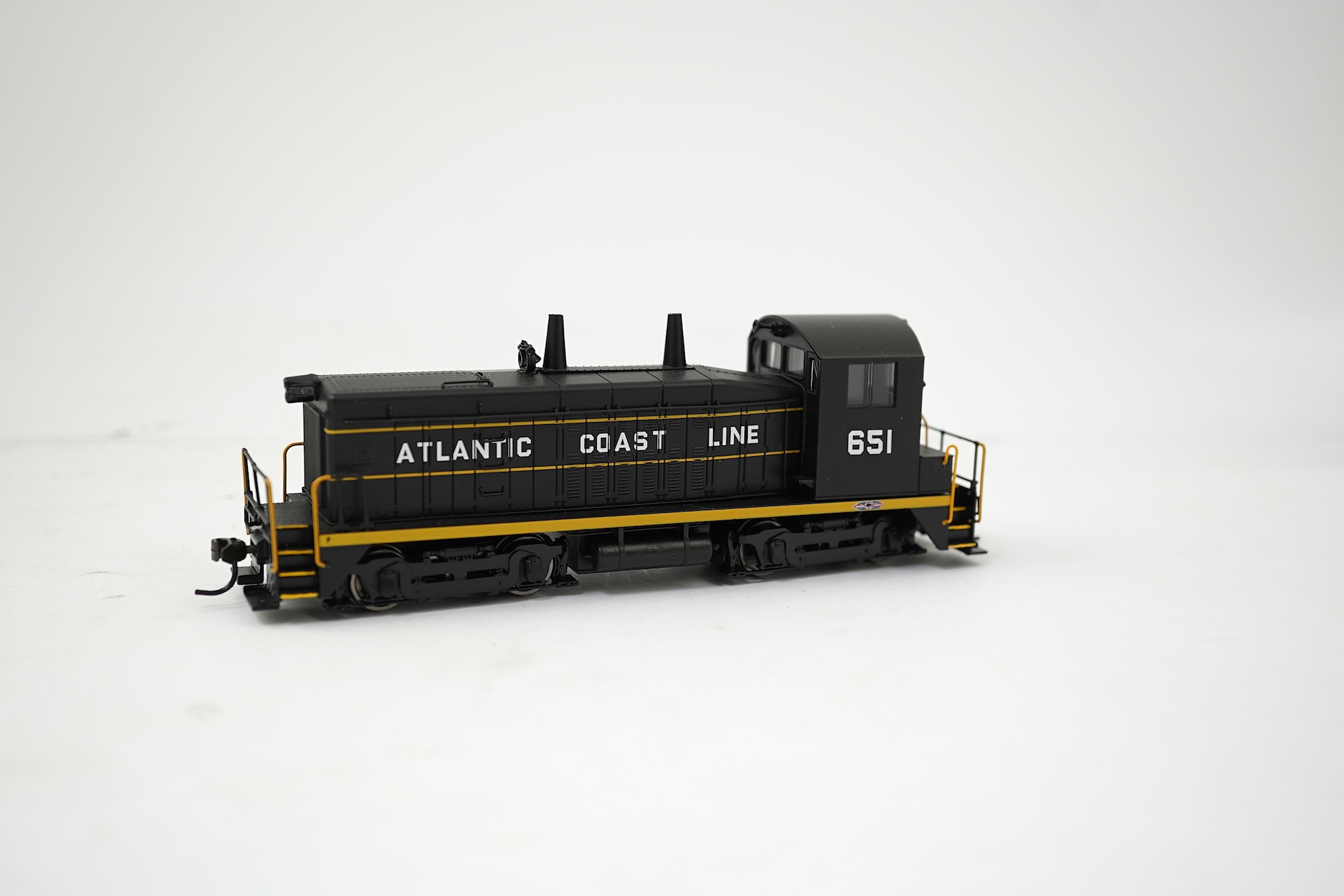 A boxed HO gauge Broadway Limited Paragon 2 Series (1215) model of Atlantic Coast Line, EMD SW7 Switcher PHII, 651, Bo-Bo diesel locomotive, powered for two rail operation.